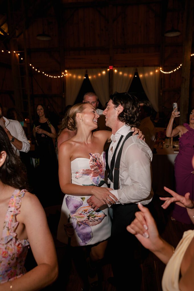 Bride and groom dancing together during the reception.