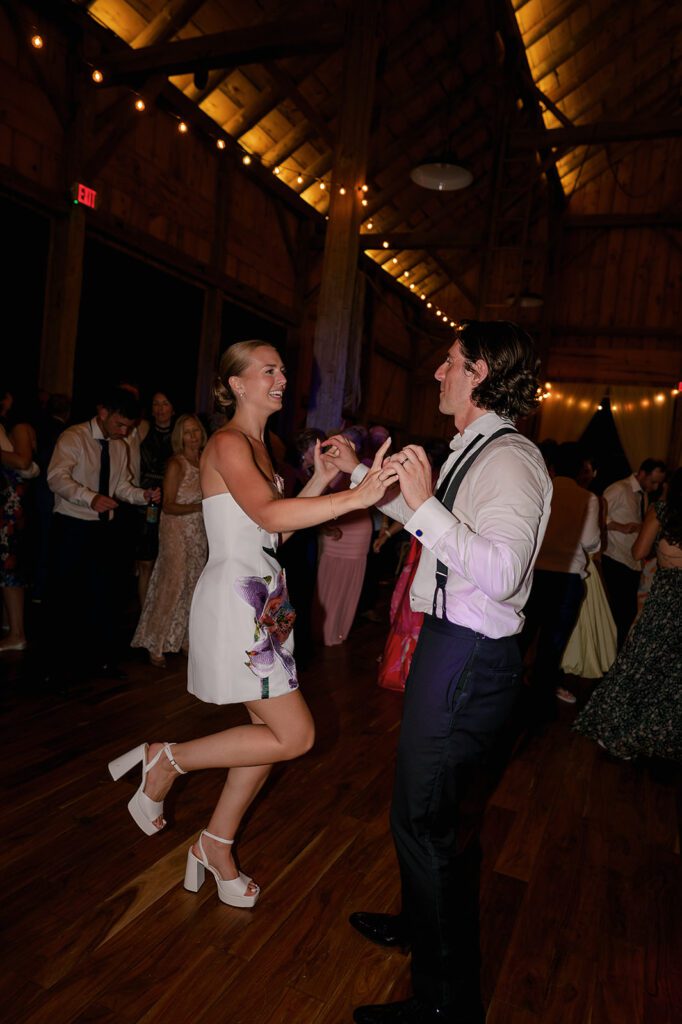 Bride and groom dancing together during the reception.